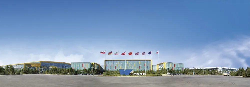 Yuanda (CNYD) factory campus panorama with international flags and production/warehouse complex