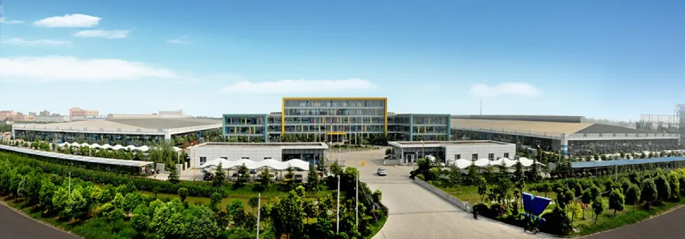 Large manufacturing and engineering campus — aerial panoramic view of production complex